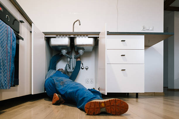 Professional Drain Cleaning technician working in Drewsville, NH